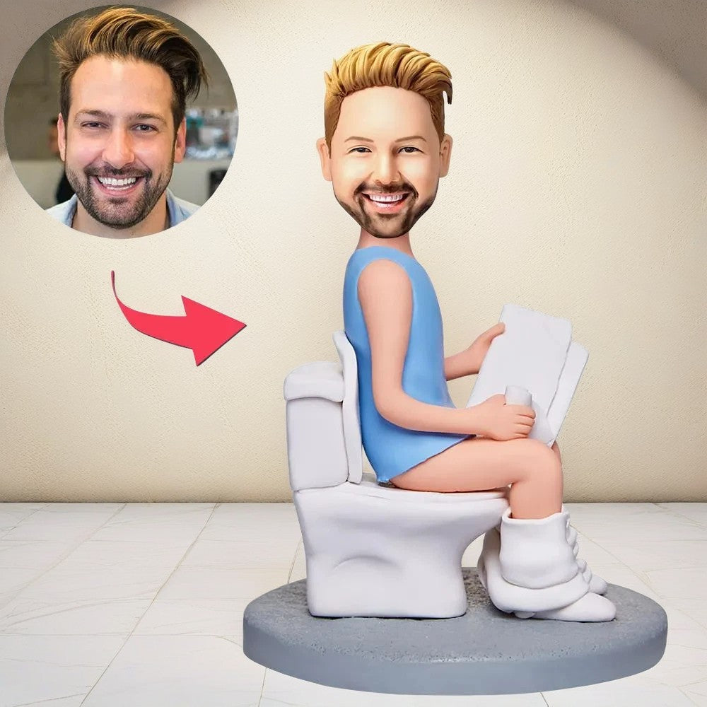 Man Sitting On The Toilet And Reading A Book Custom Bobblehead With Engraved Text